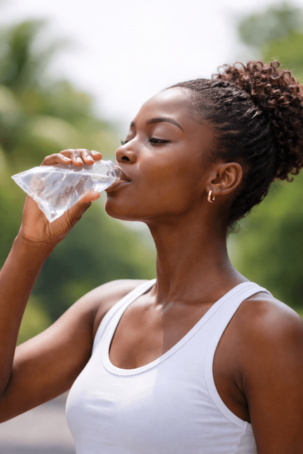 Woman enjoying Alpine Fresh water